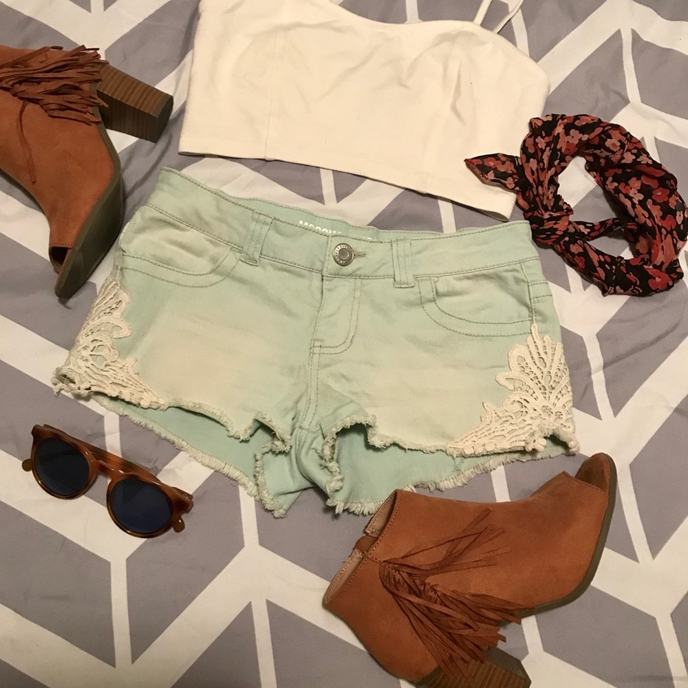 Mint cutoffs with lacy detail